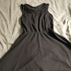 Mesh shoulder black skater dress